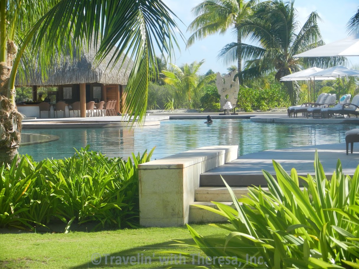 Resort pool and thatched pavilion at Four Seasons Resort Bora Bora
