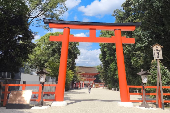 Vermilion torii at Shimogamo Shrine, with the shrine hall at the end of the path