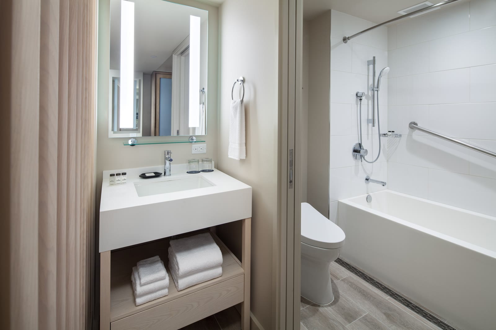 Sheraton Waikiki guest bathroom with a tub and shower