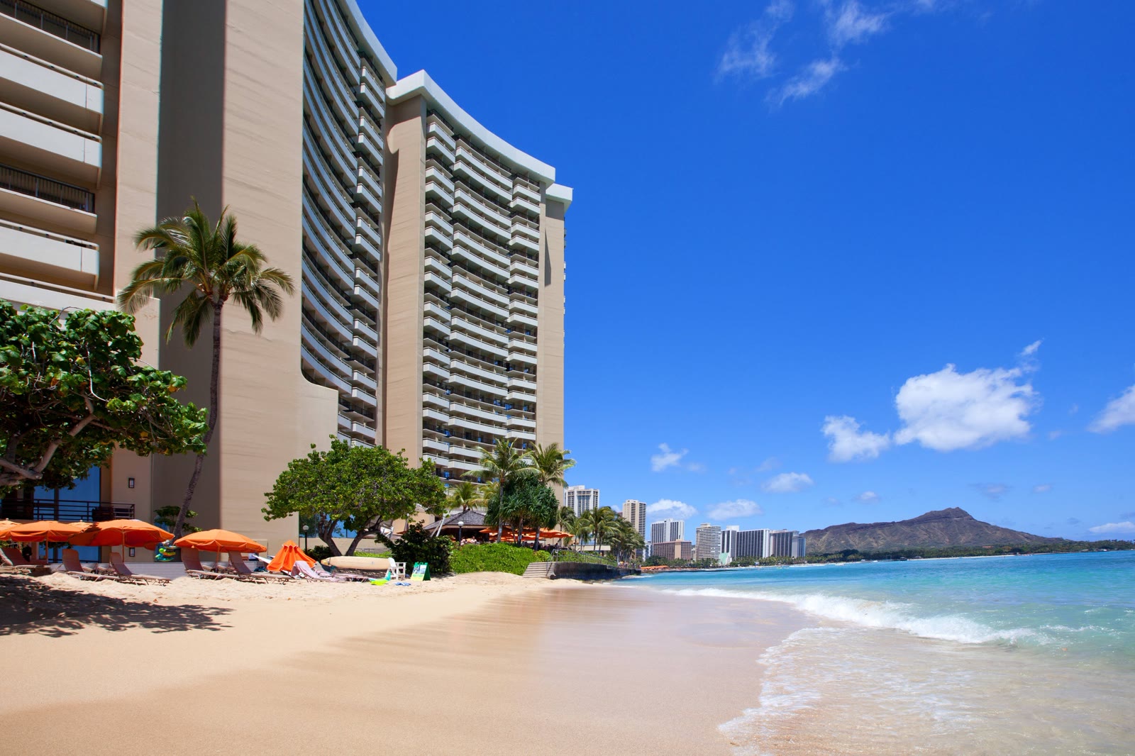 Waikiki Beach in front of Sheraton Waikiki, with Diamond Head down the shore