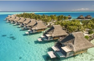 Aerial view of Conrad Bora Bora Nui overwater bungalows on the turquoise Motu To'opua lagoon