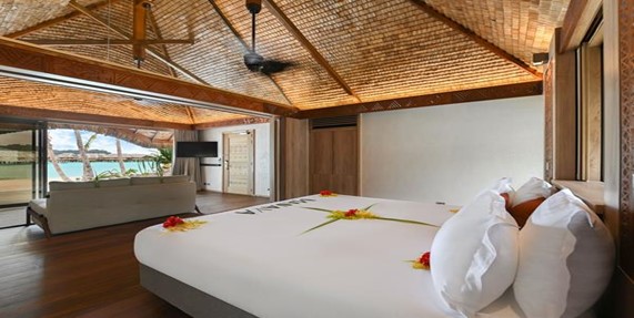 Le Bora Bora Beach Villa with Pool king bedroom