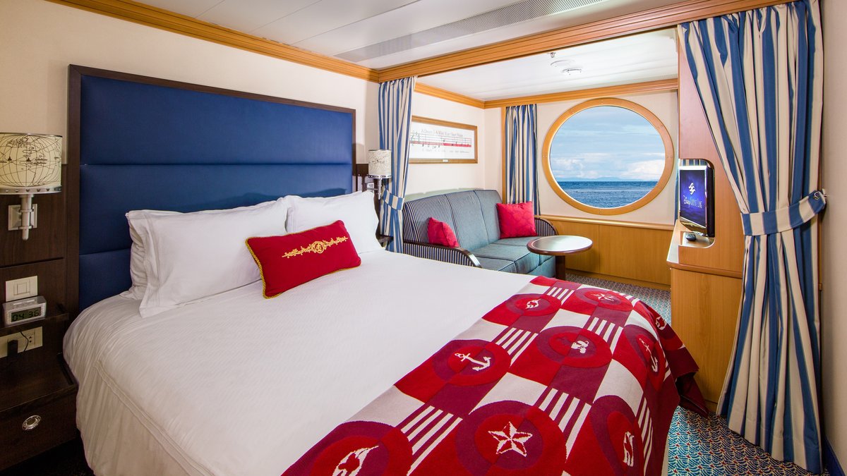 Deluxe Oceanview Stateroom with porthole aboard Disney Magic