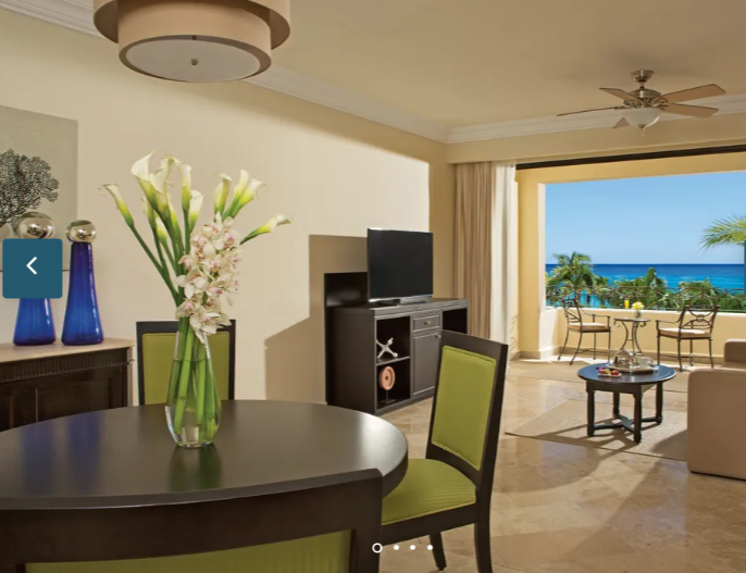 Dreams Los Cabos Family Junior Suite Ocean View living and dining area with ocean-view balcony
