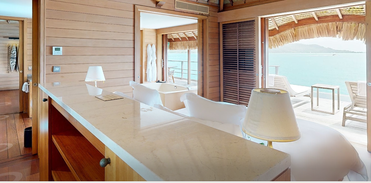 Lagoon Overwater Plunge Pool villa king bed with lagoon views