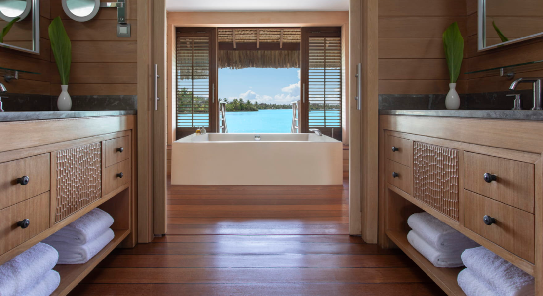 Premier Mountain Overwater Villa terrace overlooking the lagoon and mountains
