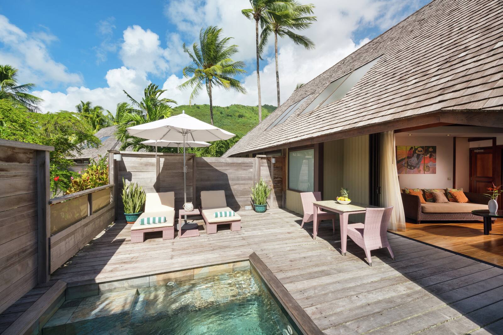 Hilton Moorea Garden Bungalow private patio with plunge pool and lounge chairs
