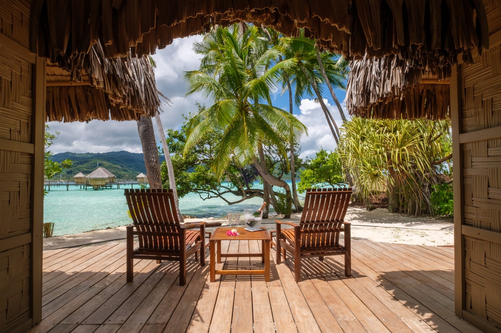 Le Taha'a Pool Beach Villa deck looking out to the lagoon