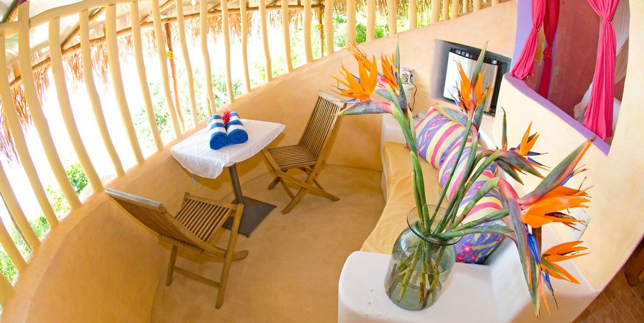 Ocean View Suite seating and kitchenette at Playa Escondida