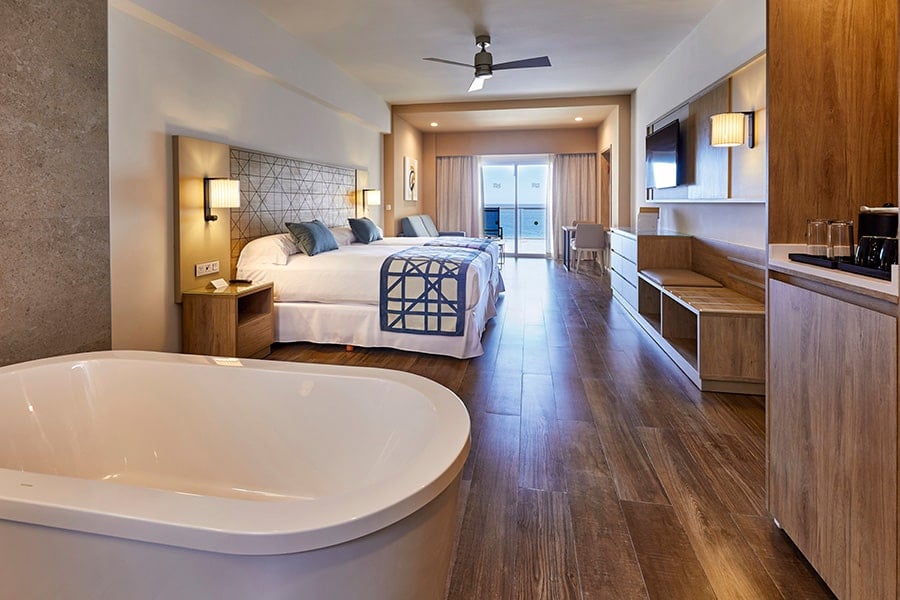 Junior Suite Ocean Front bedroom at RIU Palace Baja California