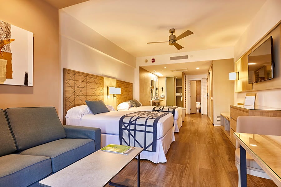 Junior Suite Tropical View bedroom at RIU Palace Baja California