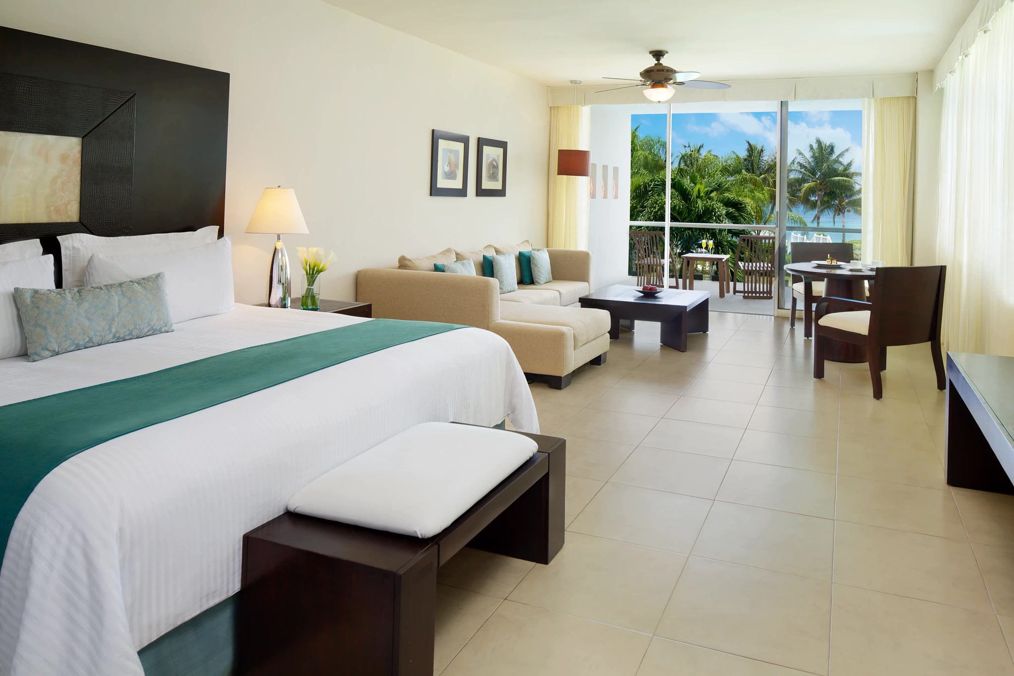 Secrets Aura Cozumel Junior Suite Oceanview king bed