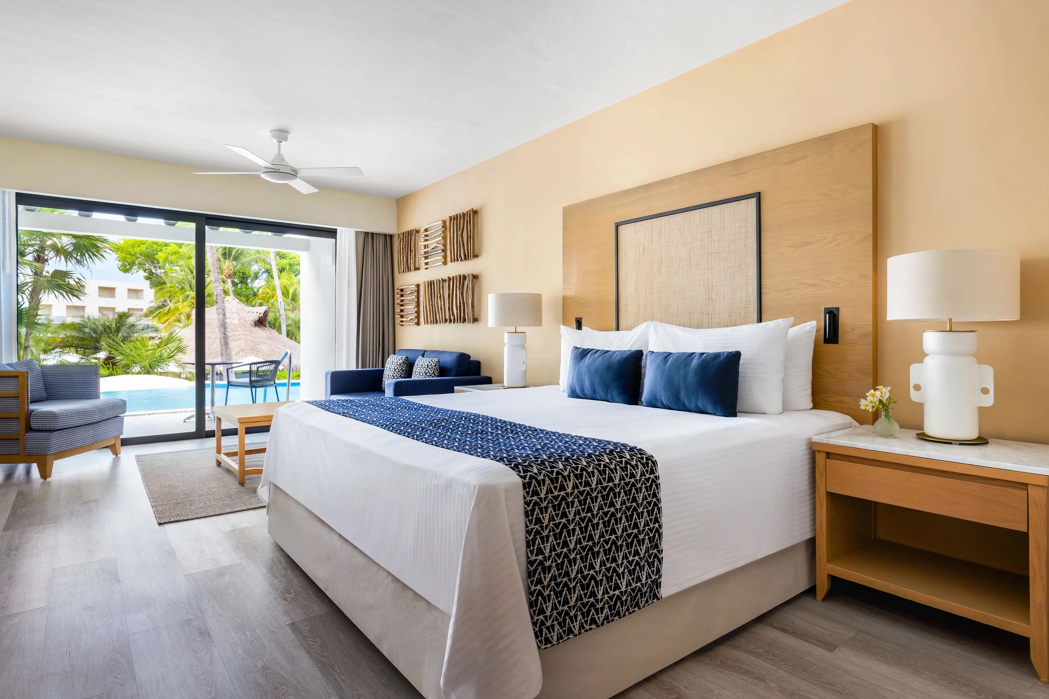 Secrets Aura Cozumel Junior Suite Swim Up king bedroom
