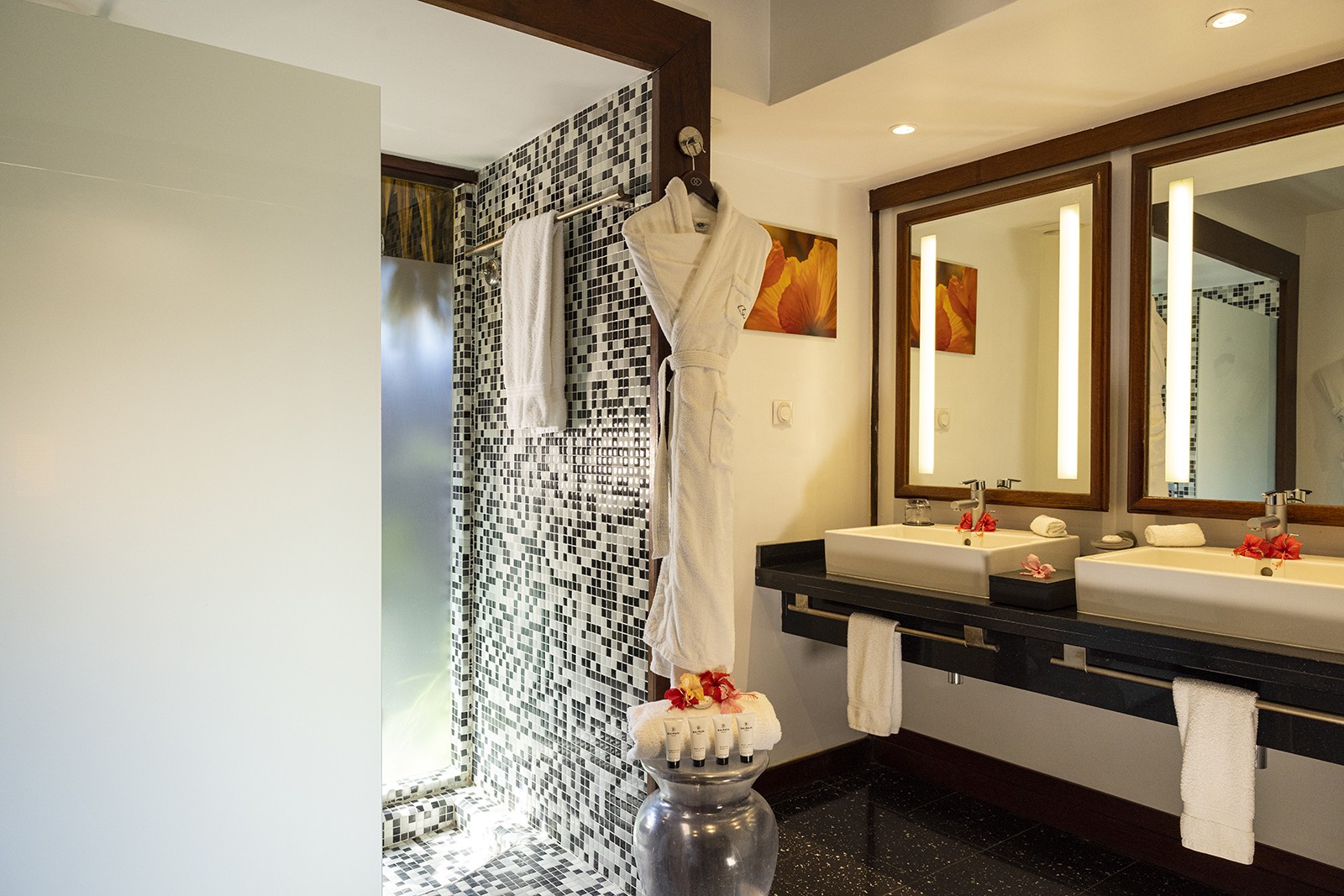 Sofitel Moorea Superior Overwater Villa bathroom with double vanity and rain shower