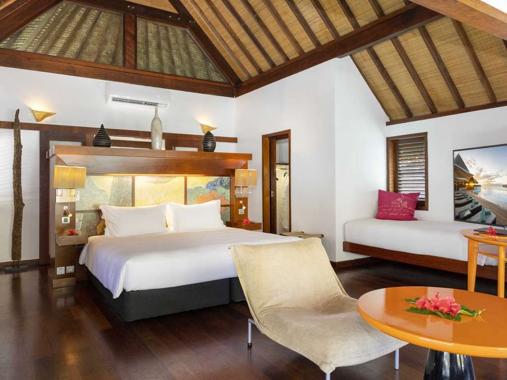 Sofitel Moorea Superior Overwater Villa bedroom and sitting area