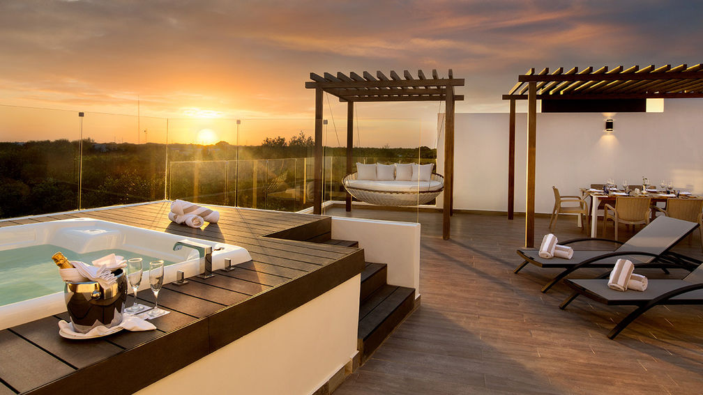 One Bedroom Penthouse rooftop terrace with hot tub at The Fives Beach Hotel & Residence