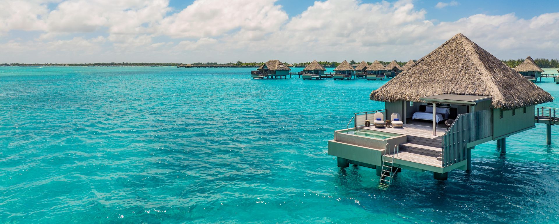 Westin Bora Bora overwater suite living area over the lagoon
