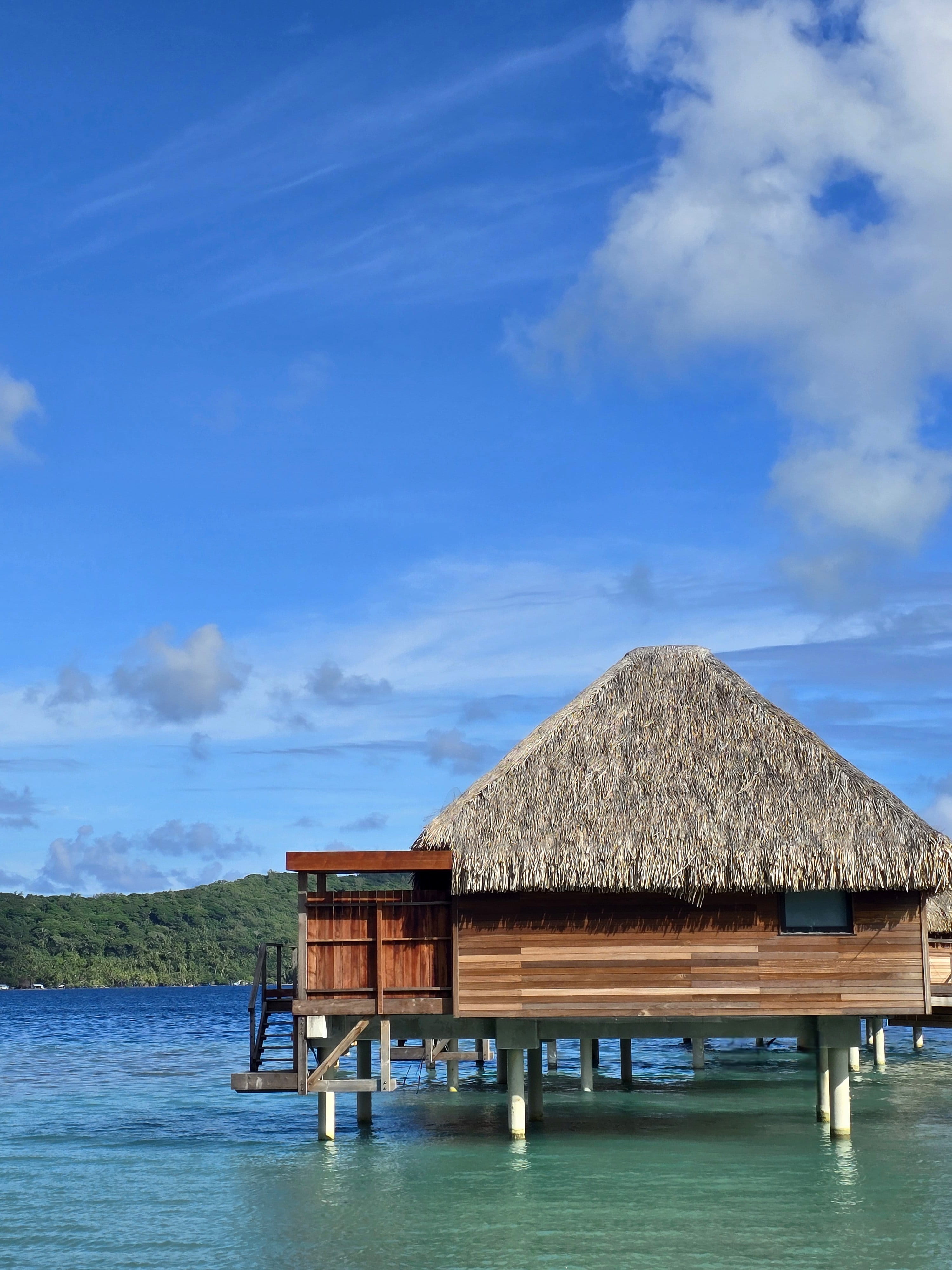 Bloody Mary's Hotel Horizon View Bungalow over the turquoise lagoon facing a forested ridge