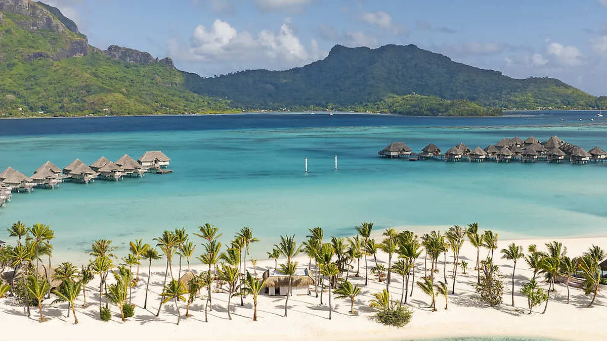 Aerial view of overwater villas at The Westin Bora Bora Resort & Spa on the Bora Bora lagoon