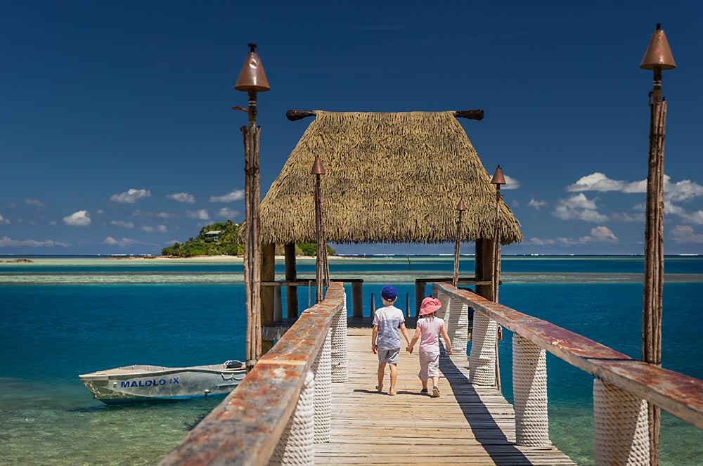 Kids on the pier at Malolo Island Resort Fiji
