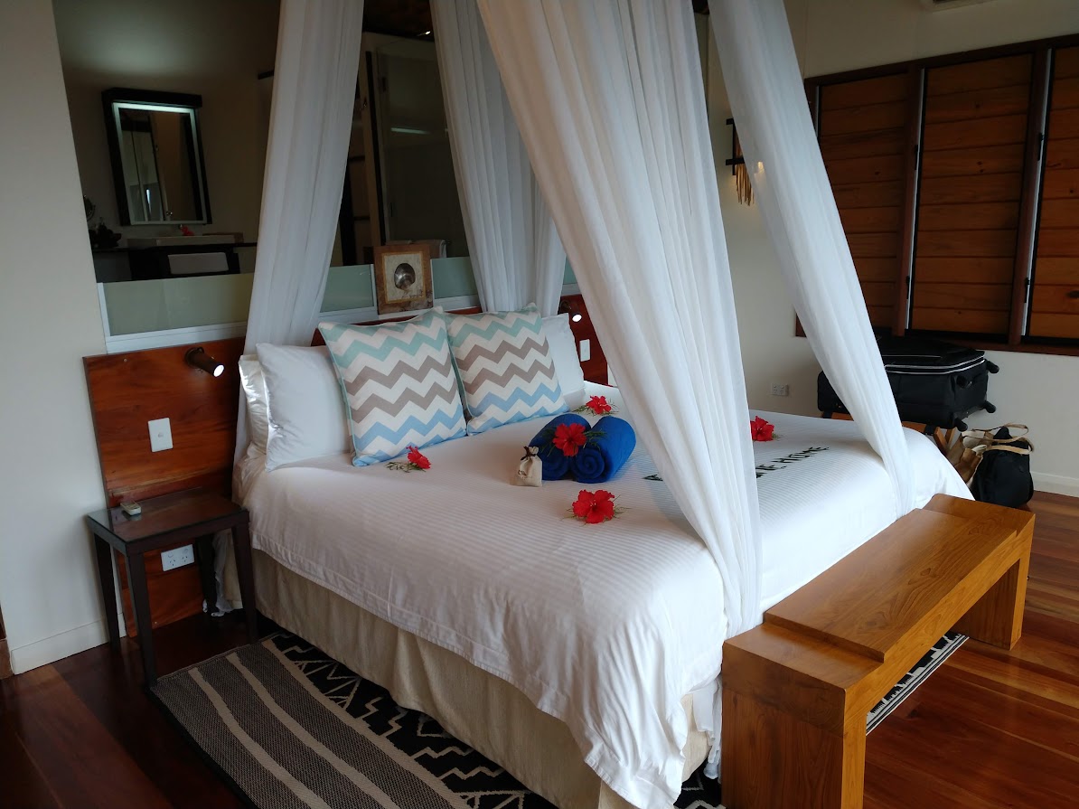 Royal Davui Island View king bedroom with island outlook