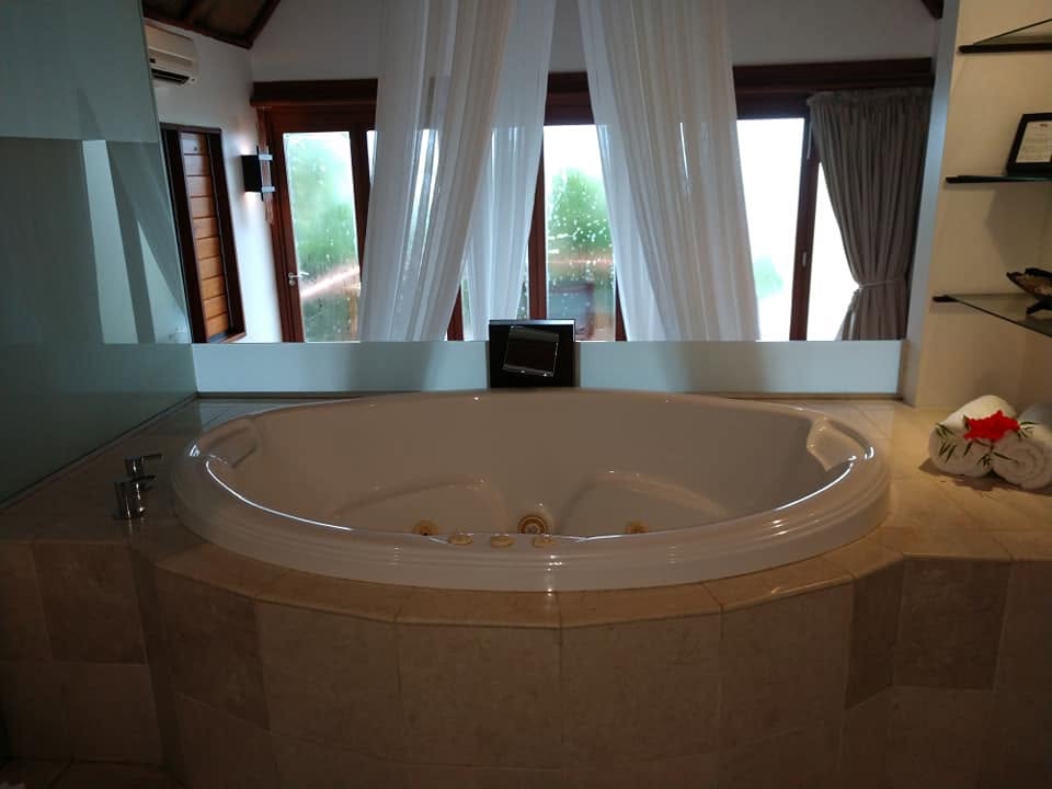 Royal Davui Island View villa soaking tub with tropical views