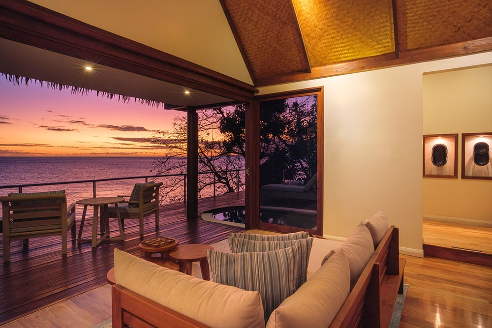 Royal Davui Sunset Plunge Pool Villa living room with sunset light