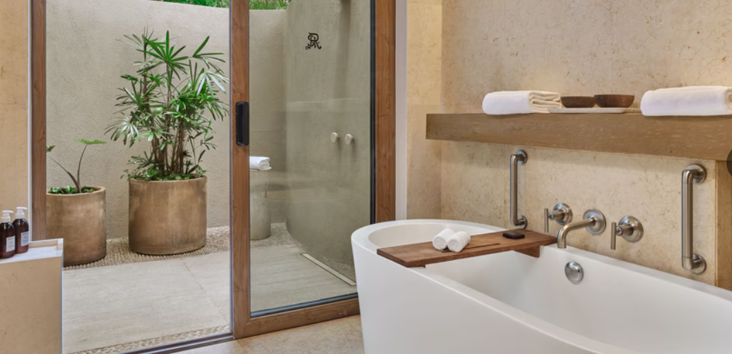 Casita Guest Room Ocean View bathroom with soaking tub and outdoor shower at The St. Regis Punta Mita