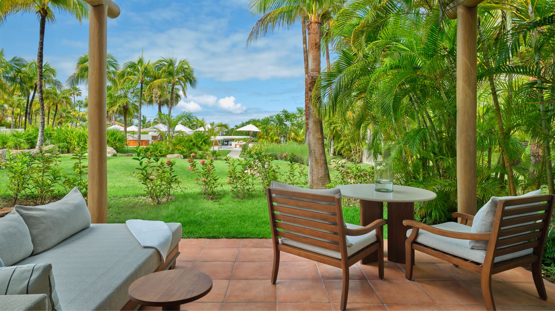 Junior Suite living space with sofa and terrace access at The St. Regis Punta Mita