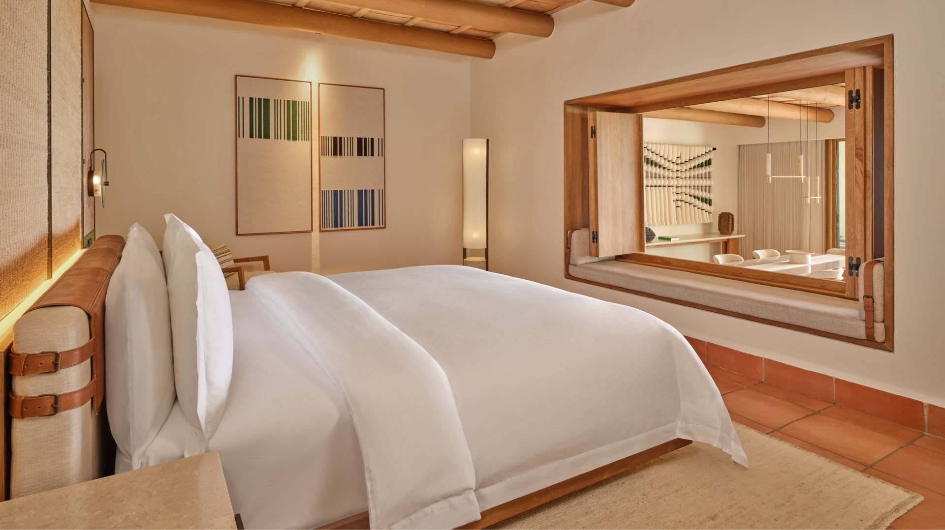 One-Bedroom Suite living room with sofa and dining space at The St. Regis Punta Mita