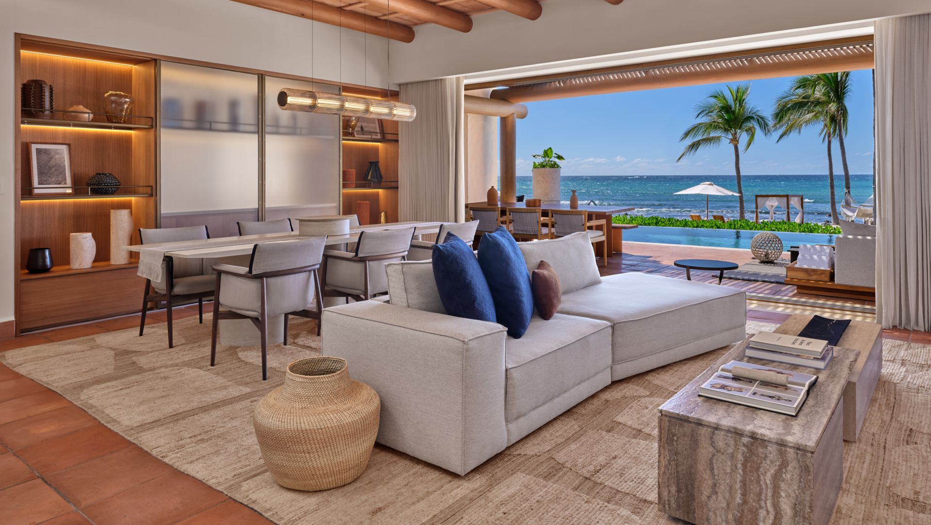 Villa living and dining area with ocean-facing terrace at The St. Regis Punta Mita