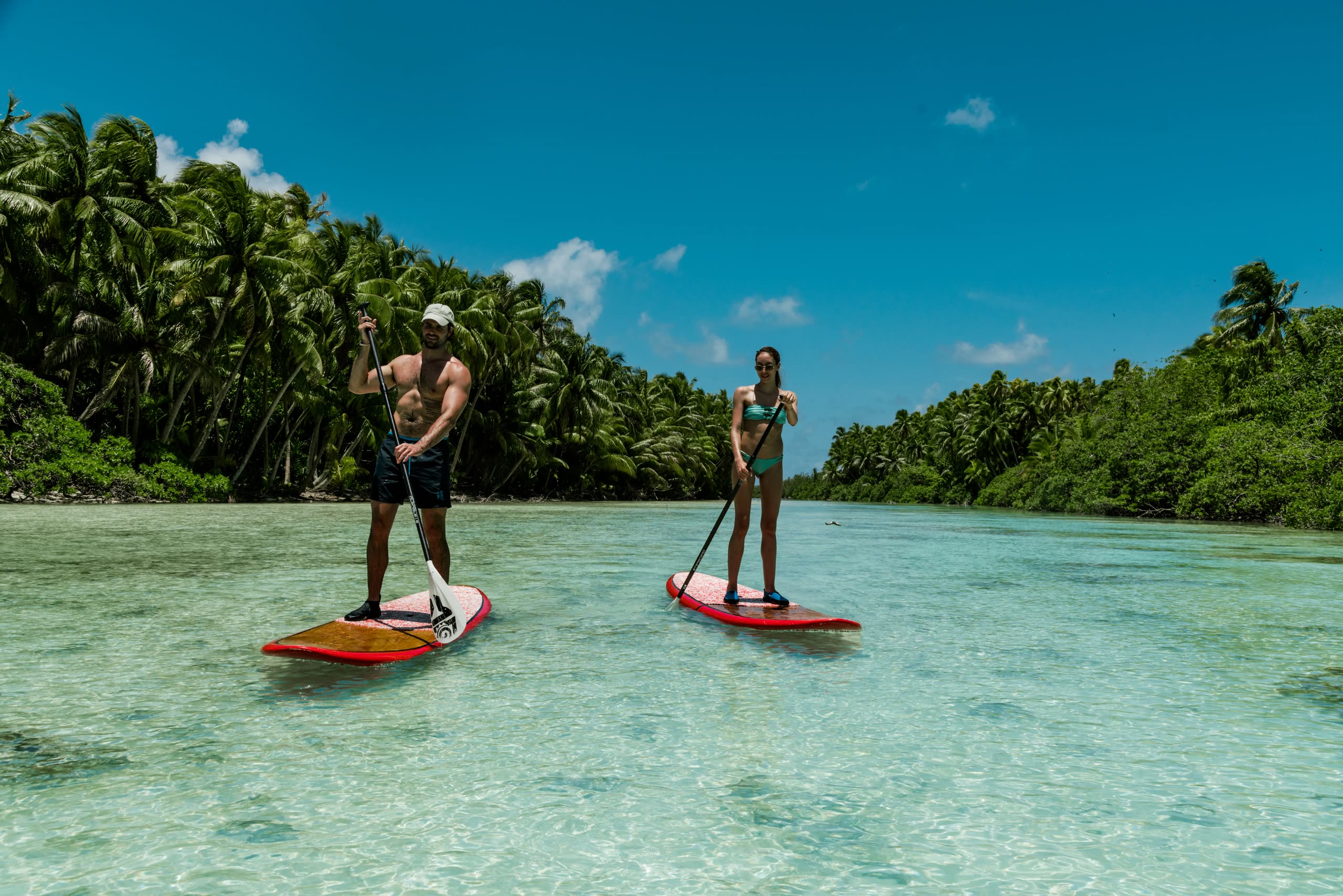 Paddleboarding in the Tetiaroa lagoon at The Brando