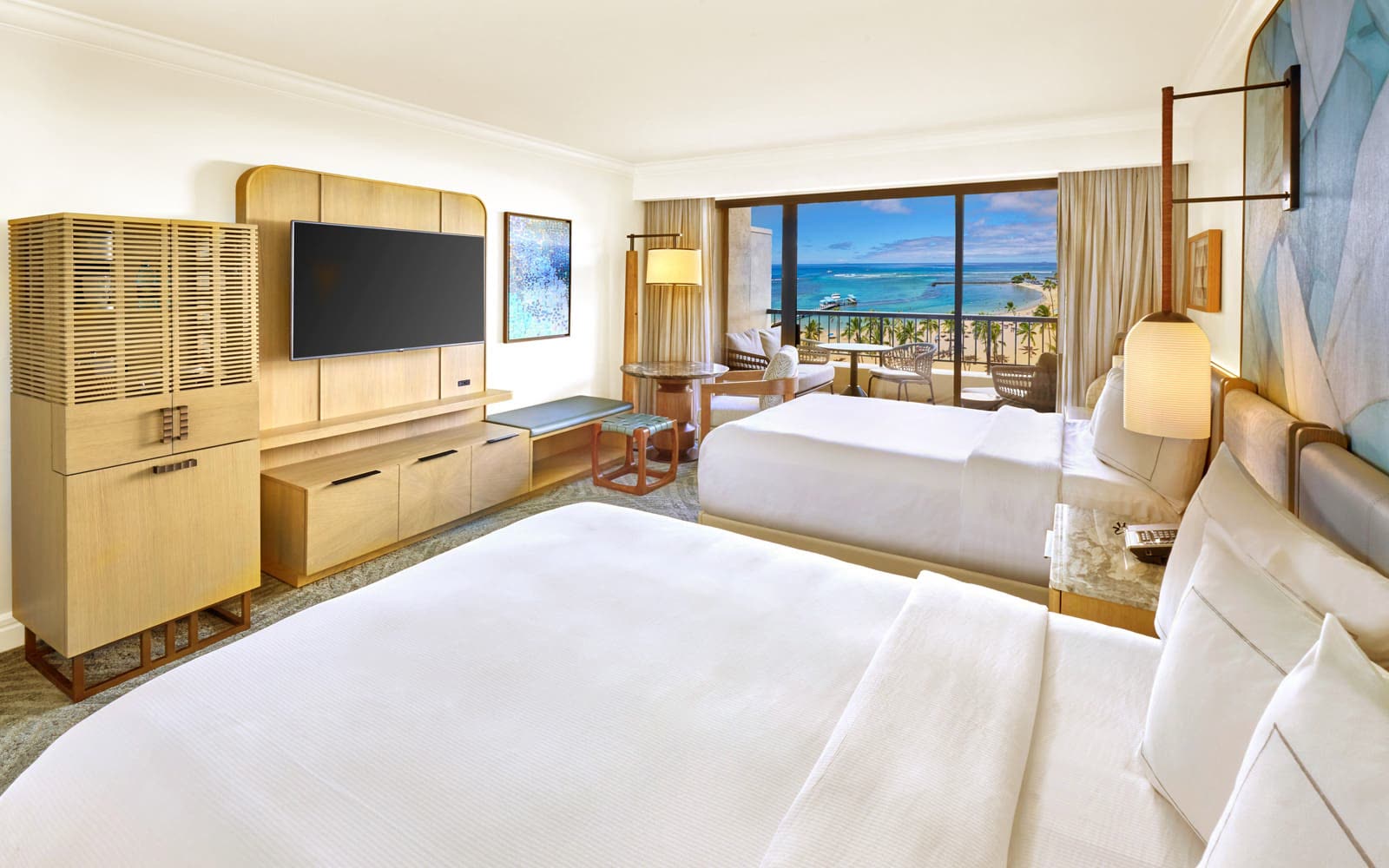 Aliʻi Tower Ocean Front room with two queen beds and a lanai facing Waikiki Beach