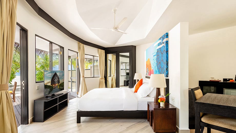 Beachfront villa terrace facing the ocean at Angsana Velavaru