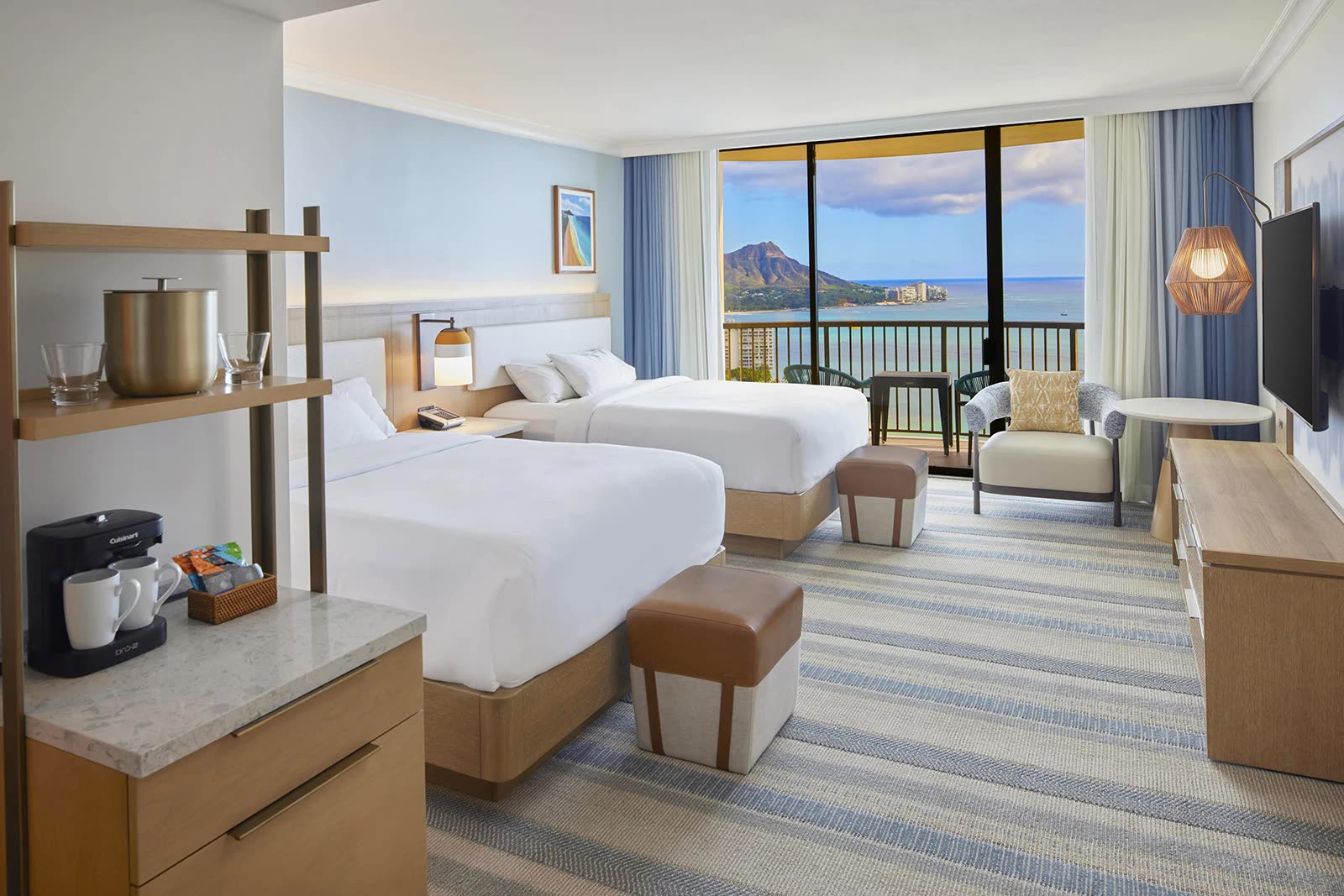 Rainbow Tower oceanfront room with two queen beds and a lanai at Hilton Hawaiian Village