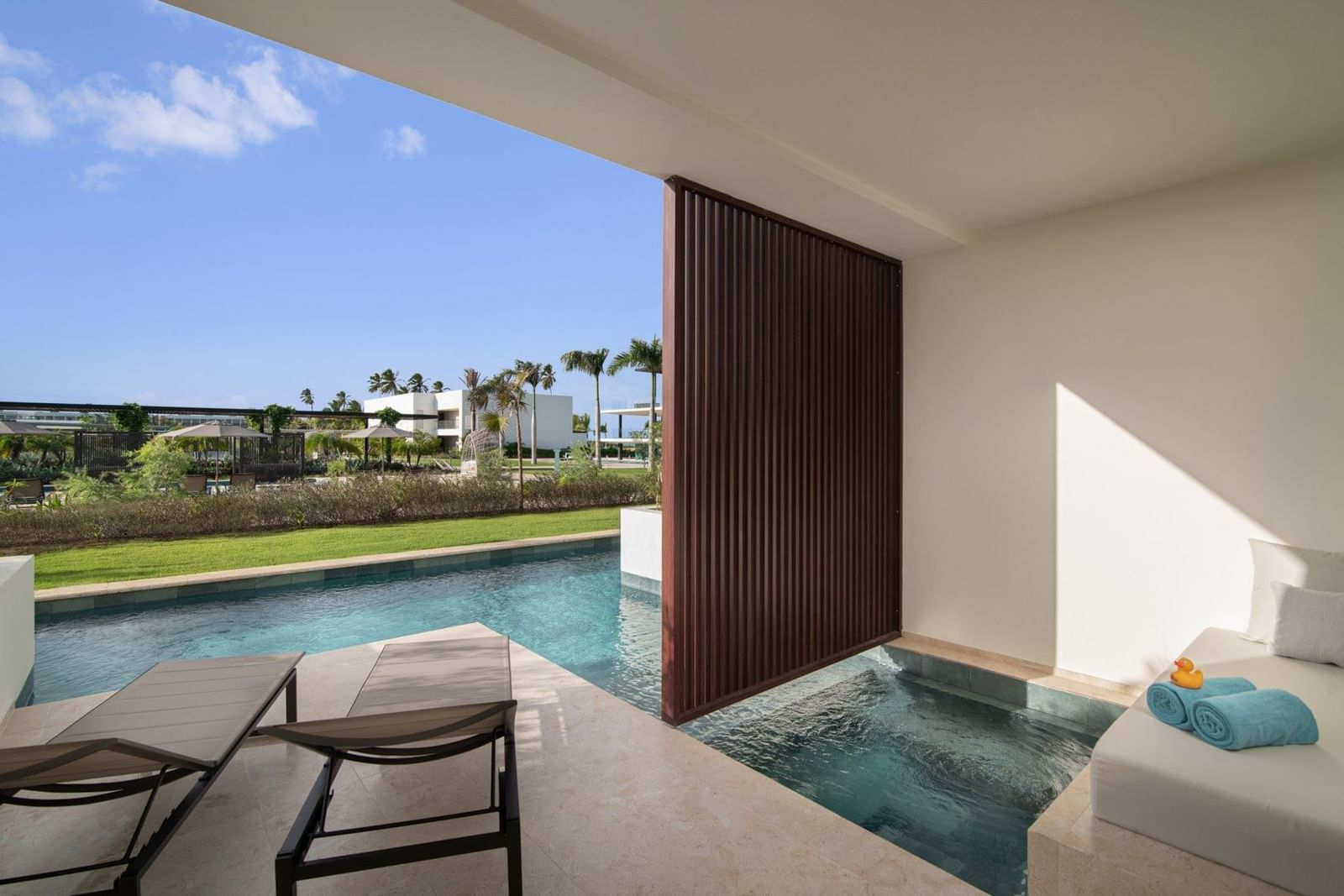 Aqua Junior Suite Swim-Up Pool View terrace at Live Aqua Punta Cana
