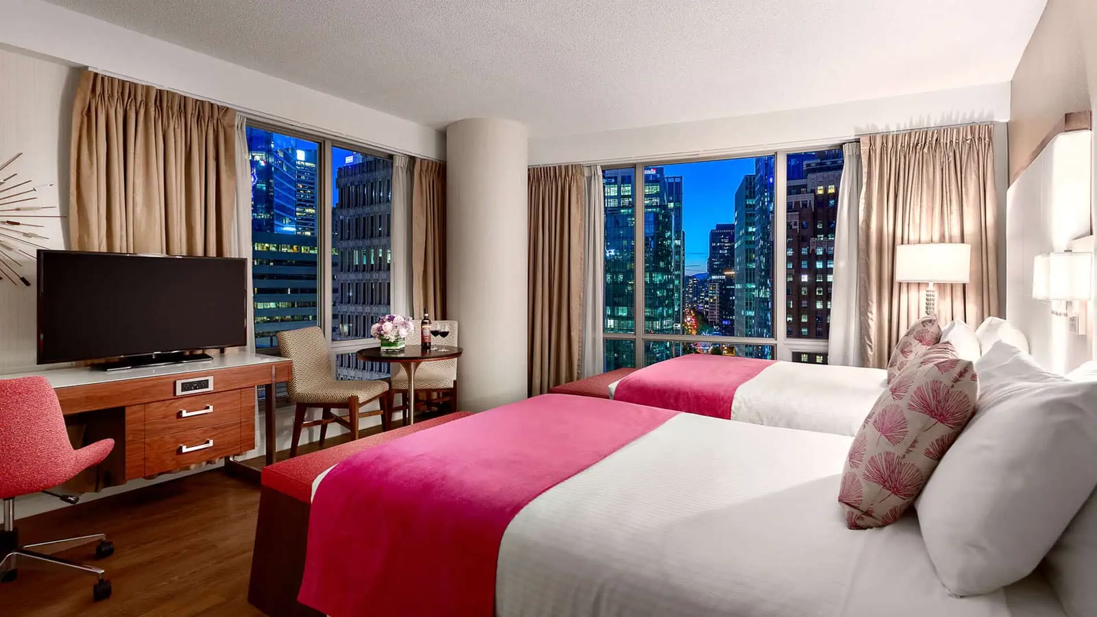 Deluxe City View room with two double beds at Auberge Vancouver Hotel