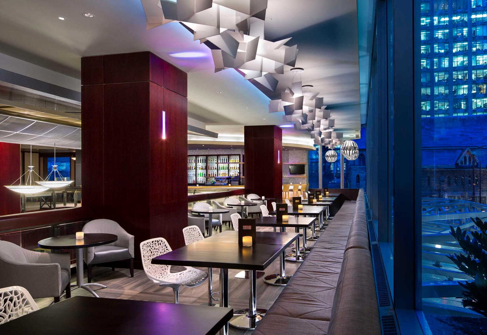 Restaurant seating with city views at Hyatt Regency Vancouver