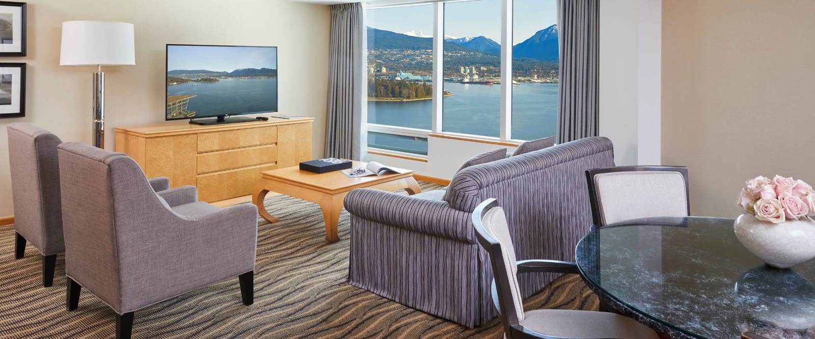 Bayview Suite living area at Pan Pacific Vancouver, with harbour and mountain views